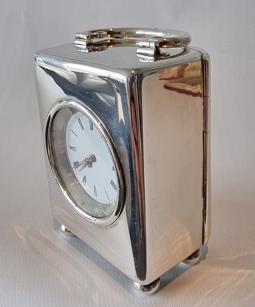A Miniature Silver Carriage Clock in original case by W. Thornhill