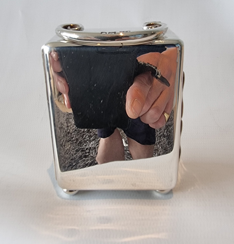A Miniature Silver Carriage Clock in original case by W. Thornhill
