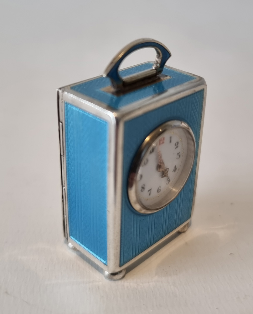 A Sub Miniature Silver and Blue Guilloche enamel Carriage Clock in Original leather Case