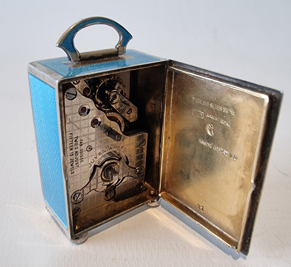 A Sub Miniature Silver and Blue Guilloche enamel Carriage Clock in Original leather Case