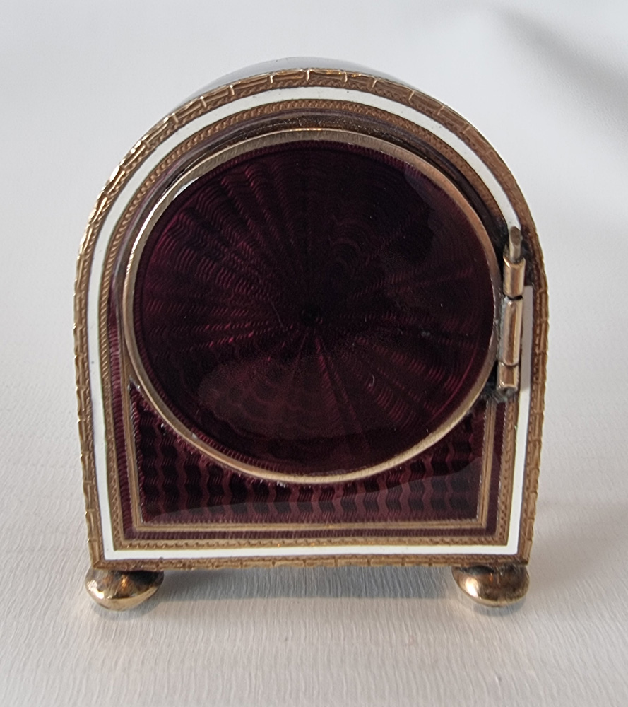 A Sub Miniature Burgundy Guilloche enamel Carriage Clock by Mathey Tissot