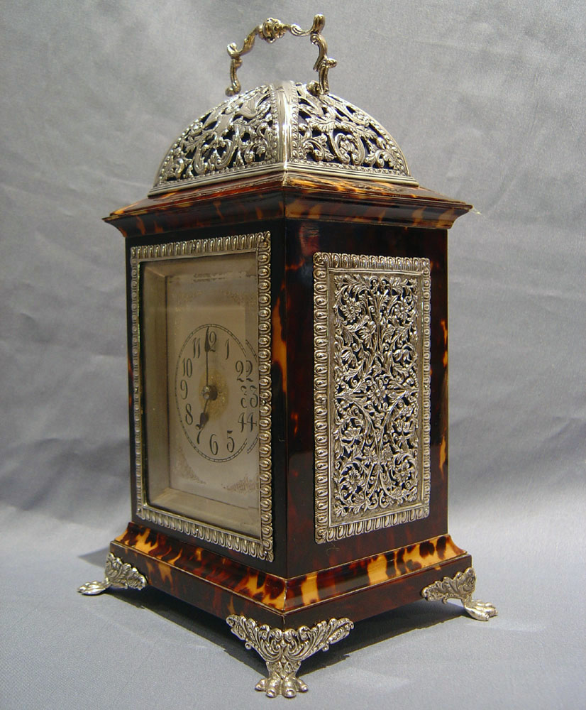Antique English tortoiseshell & silver mounted carriage clock by Louchars.