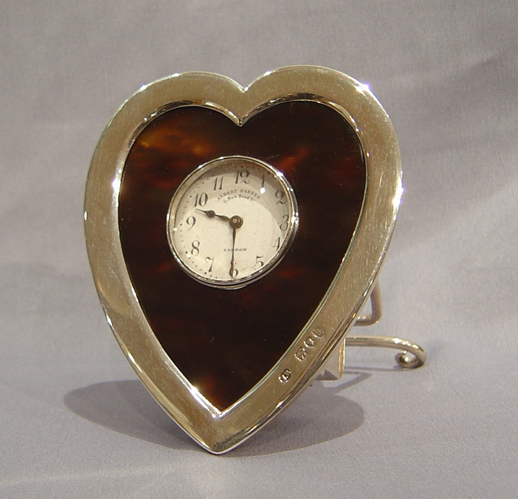 English silver and tortoiseshell heart shaped clock.