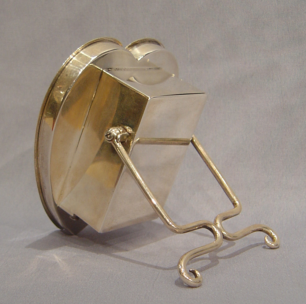 English silver and tortoiseshell heart shaped clock.
