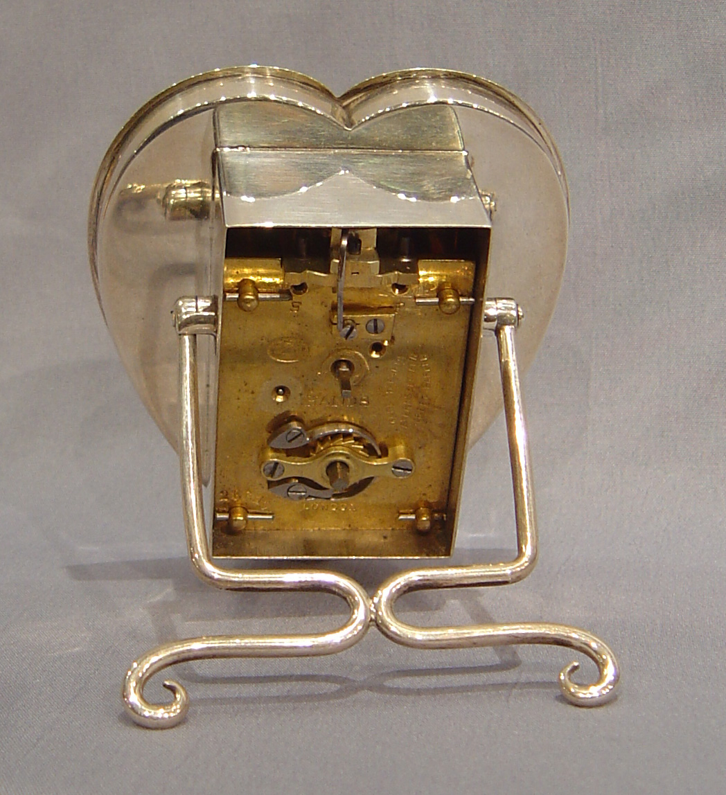 English silver and tortoiseshell heart shaped clock.
