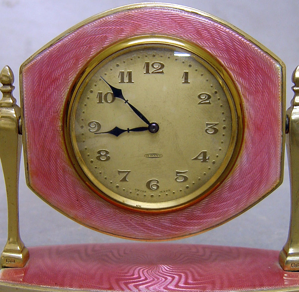 English silver & pink guilloche enamel mirror strut clock in case.