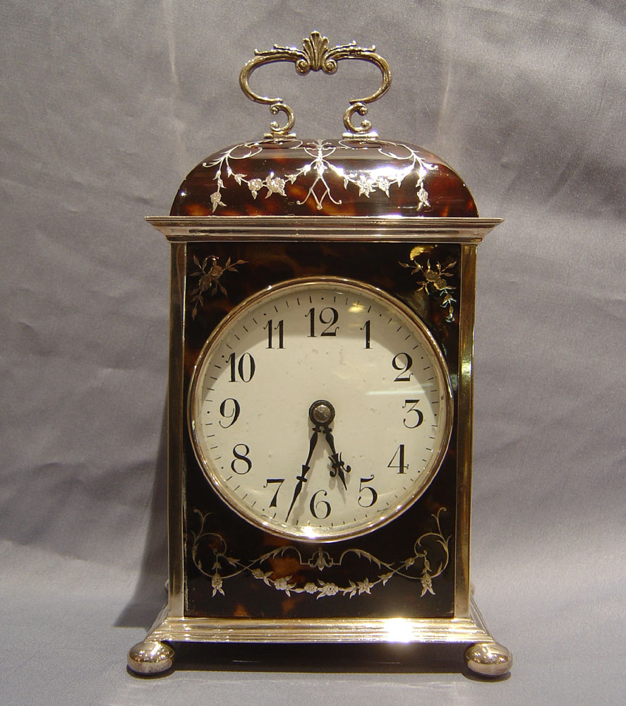 Antique English Dome topped tortoiseshell and silver pique large carriage clock by William Comyns.