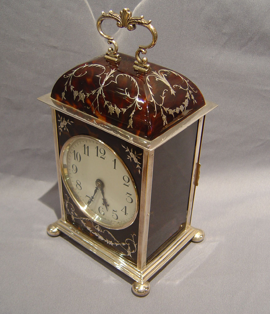 Antique English Dome topped tortoiseshell and silver pique large carriage clock by William Comyns.