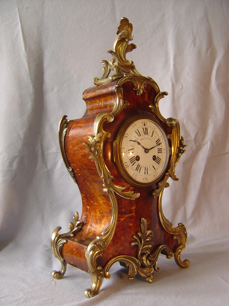 English antique ormolu mounted blond tortoiseshell mantel clock.