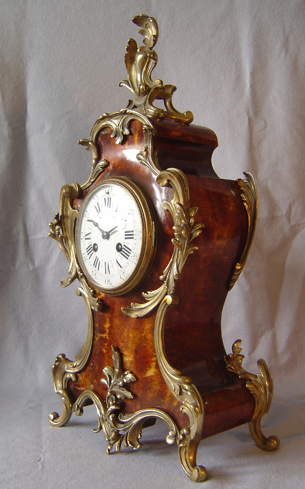 English antique ormolu mounted blond tortoiseshell mantel clock.