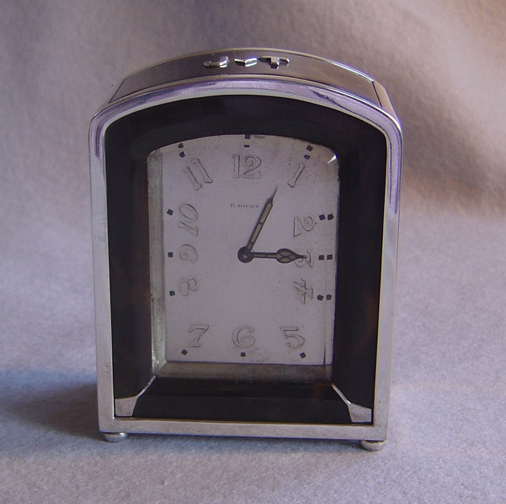 Antique Art Deco French silver and tortoiseshell 8 day carriage clock.