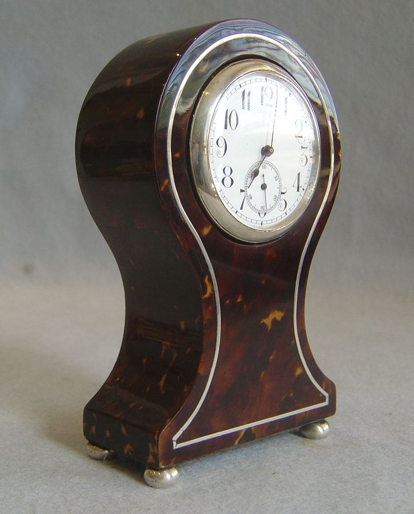 Tortoiseshell and silver small balloon clock