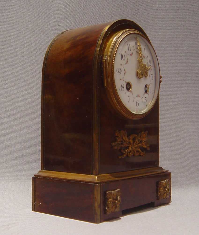 French antique dome topped tortoiseshell and bronze mounted mantel clock.