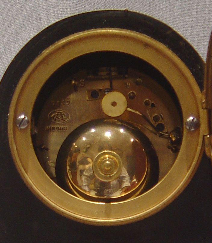 French antique dome topped tortoiseshell and bronze mounted mantel clock.