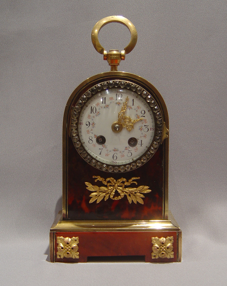 Antique English jewelled scarlet tortoiseshell and gilt bronze clockclock.