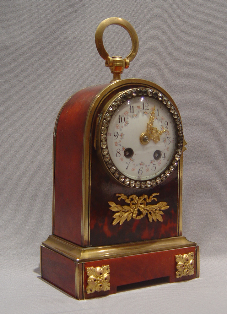 Antique English jewelled scarlet tortoiseshell and gilt bronze clockclock.