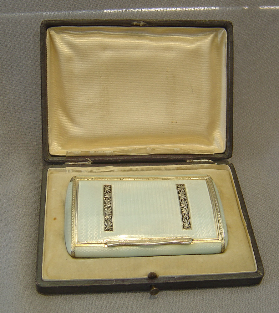 Silver and enamel cased card case in silver with grey guilloche enamel.