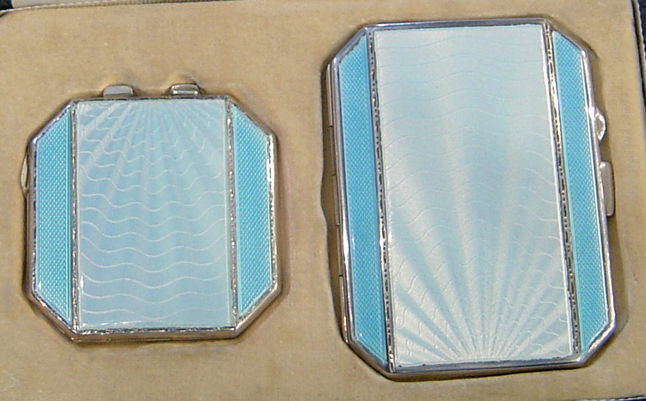 Art Deco silver and enamel compact set.