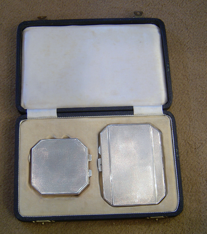 Art Deco silver and enamel compact set.