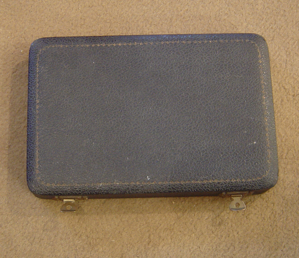 Art Deco silver and enamel compact set.