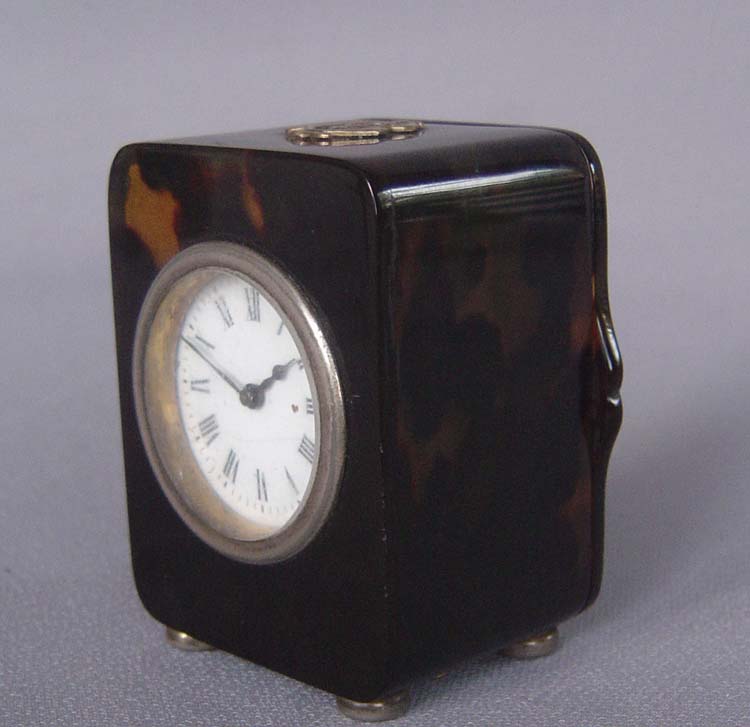 Tortoiseshell and silver gilt English Edwardian antique carriage clock dated 1905.