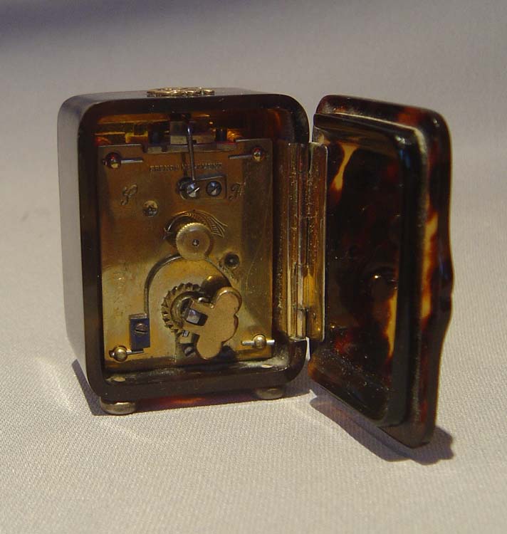 Tortoiseshell and silver gilt English Edwardian antique carriage clock dated 1905.