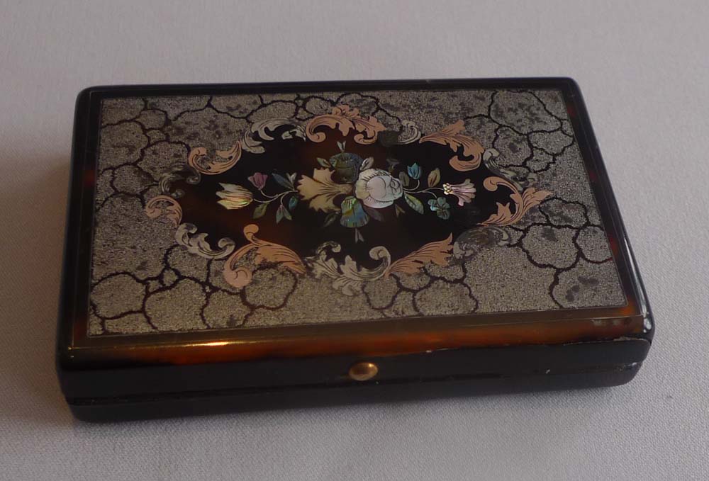 Antique tortoiseshell and gold and shell pique snuff box.