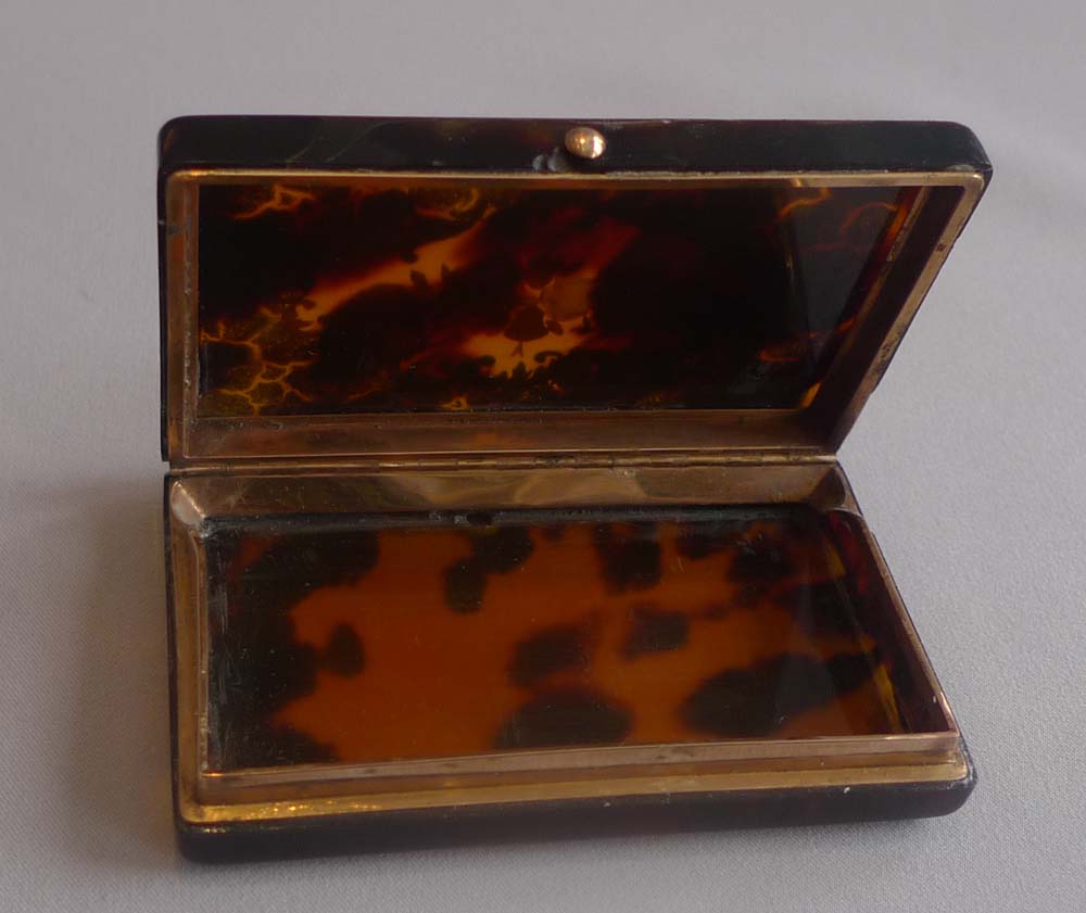 Antique tortoiseshell and gold and shell pique snuff box.