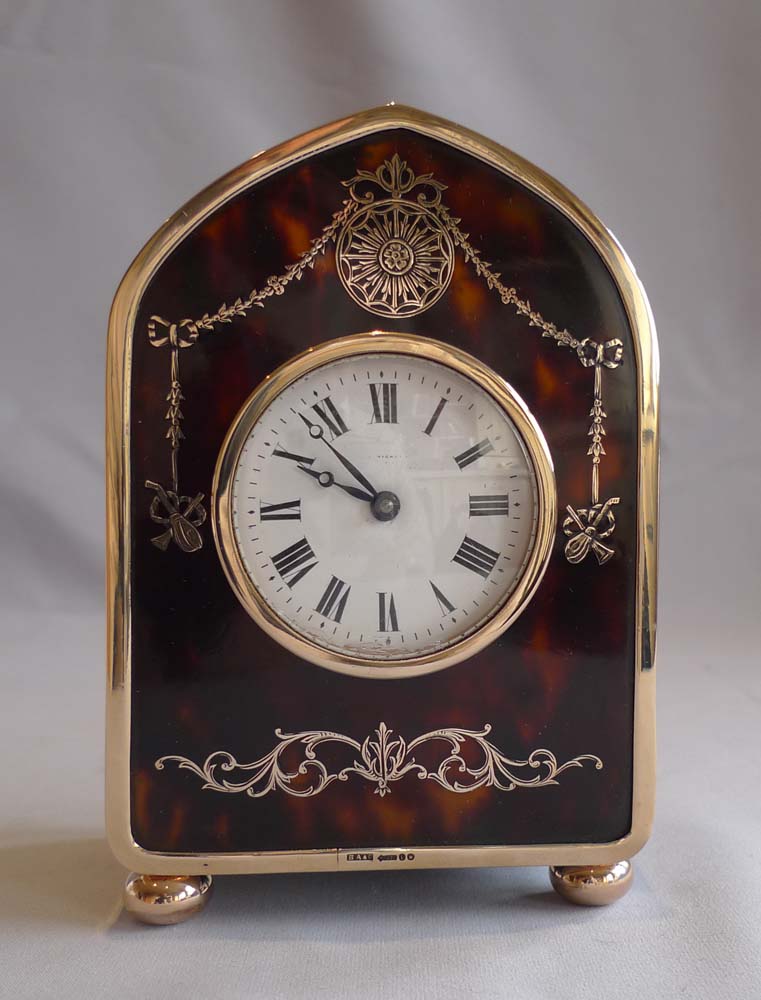Gold and gold pique and tortoiseshell carriage clock hallmarked for H. Aumont and Co. London 1910.