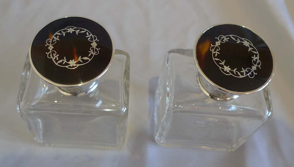 Tortoiseshell and silver picque lidded six glass jars London 1929.