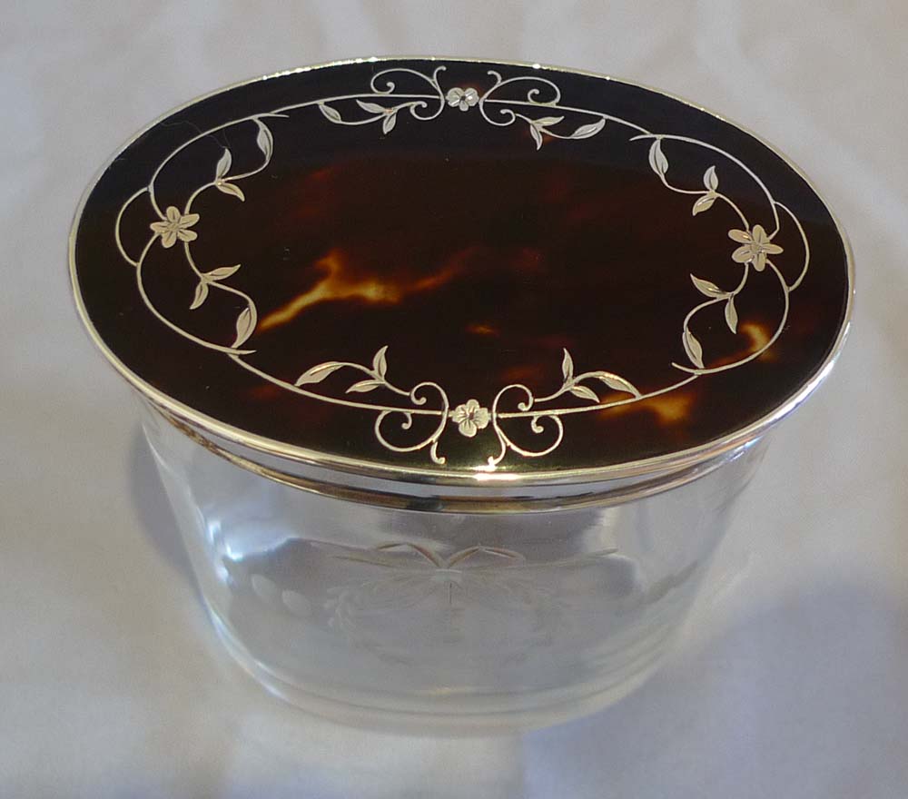 Tortoiseshell and silver picque lidded six glass jars London 1929.