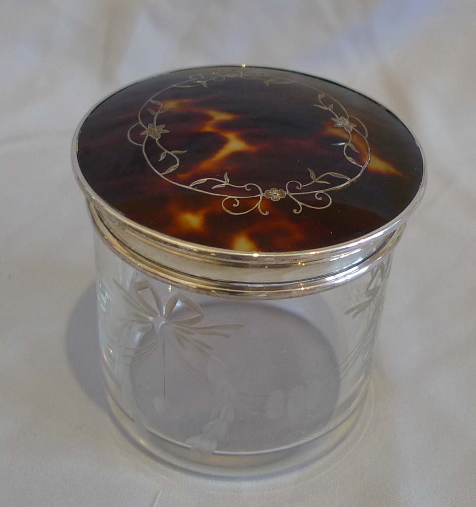Tortoiseshell and silver picque lidded six glass jars London 1929.