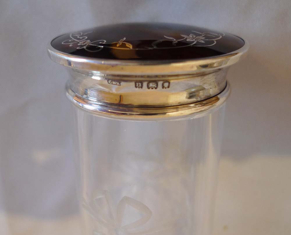 Tortoiseshell and silver picque lidded six glass jars London 1929.