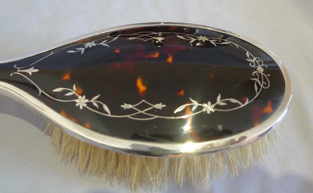 Tortoiseshell and silver picque 5 piece brush and mirror set (unused) London 1929.