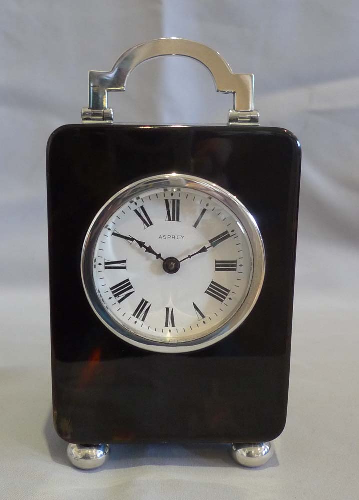 Antique tortoiseshell and silver carriage clock by Asprey of London.