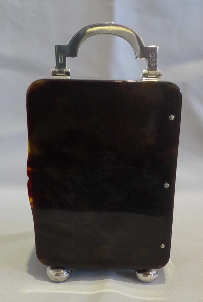 Antique tortoiseshell and silver carriage clock by Asprey of London.