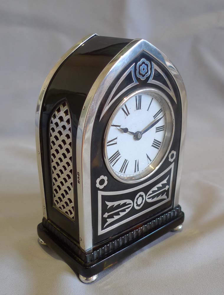 Antique English Gothic design lancet topped  tortoiseshell & silver mounted clock by William Comyns.