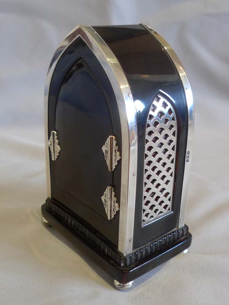 Antique English Gothic design lancet topped  tortoiseshell & silver mounted clock by William Comyns.