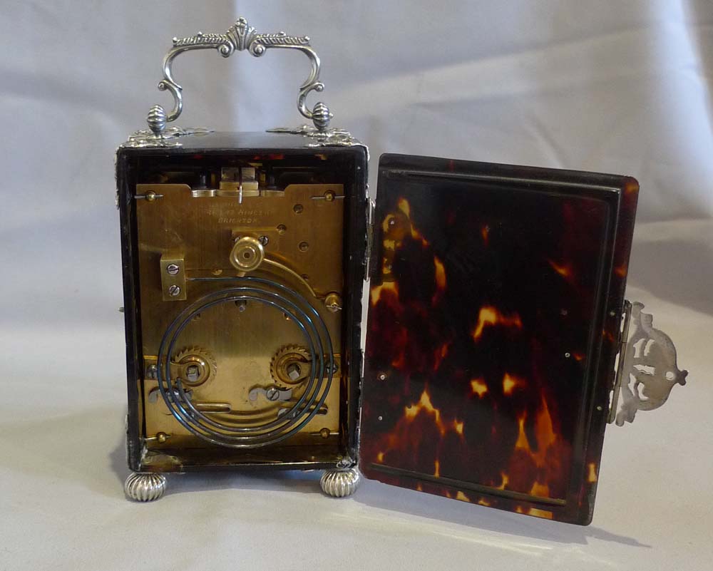 Antique English silver mounted & tortoiseshell carriage clock of substantial size.