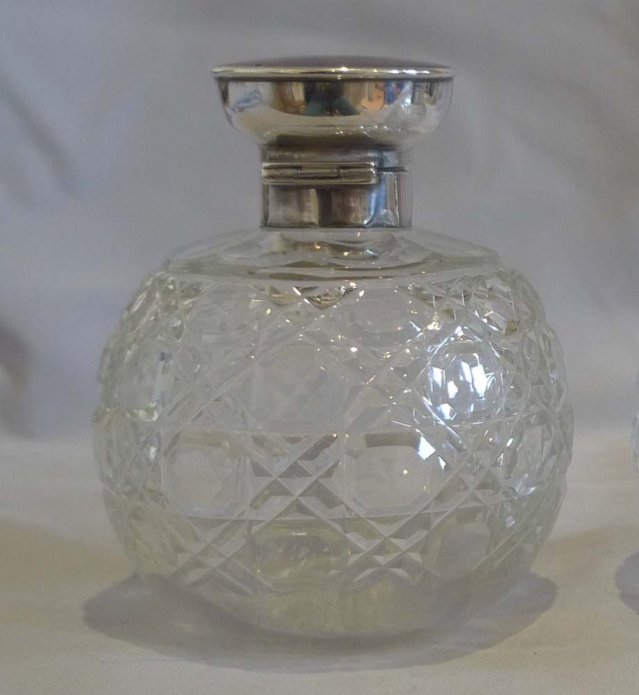 Pair tortoiseshell pique silver and cut glass spherical perfume bottles.