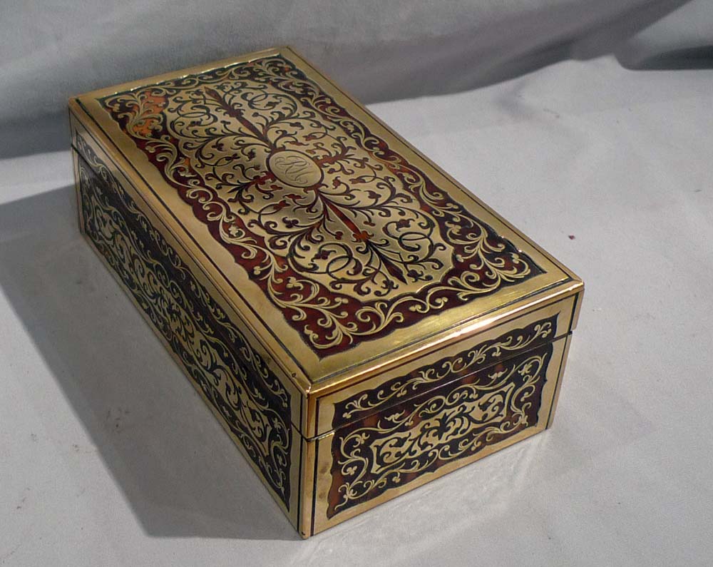 English Victorian rosewood and Boulle decorated box lined for cigars.