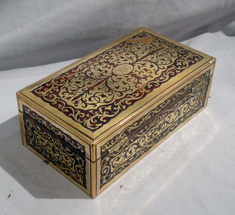 English Victorian rosewood and Boulle decorated box lined for cigars.