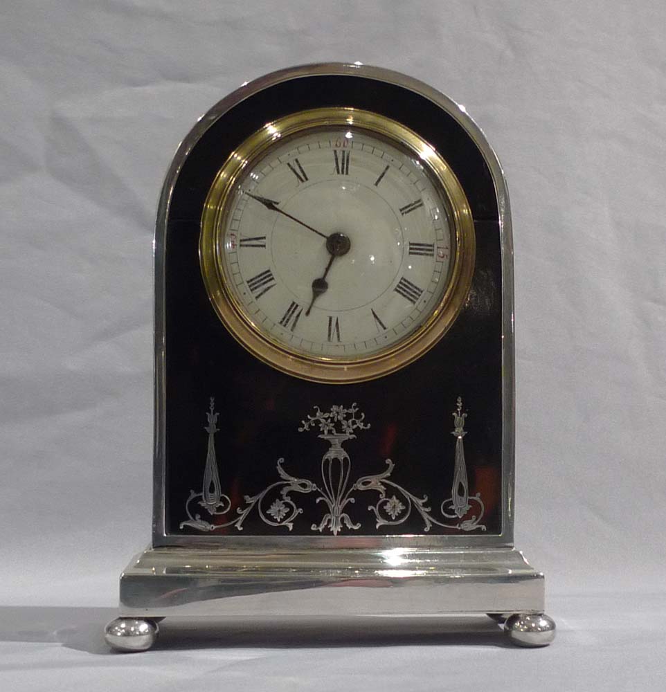 English tortoiseshell, silver pique and leather mantel clock