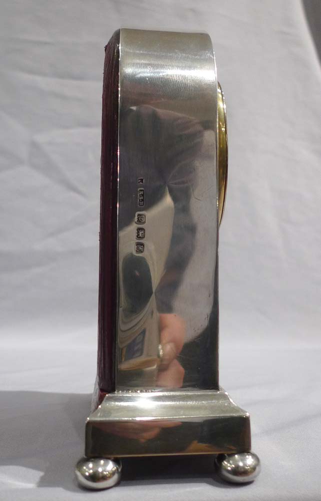 English tortoiseshell, silver pique and leather mantel clock