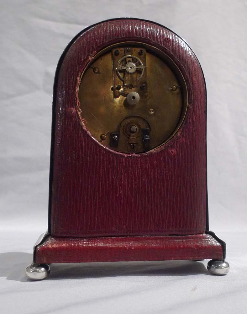 English tortoiseshell, silver pique and leather mantel clock