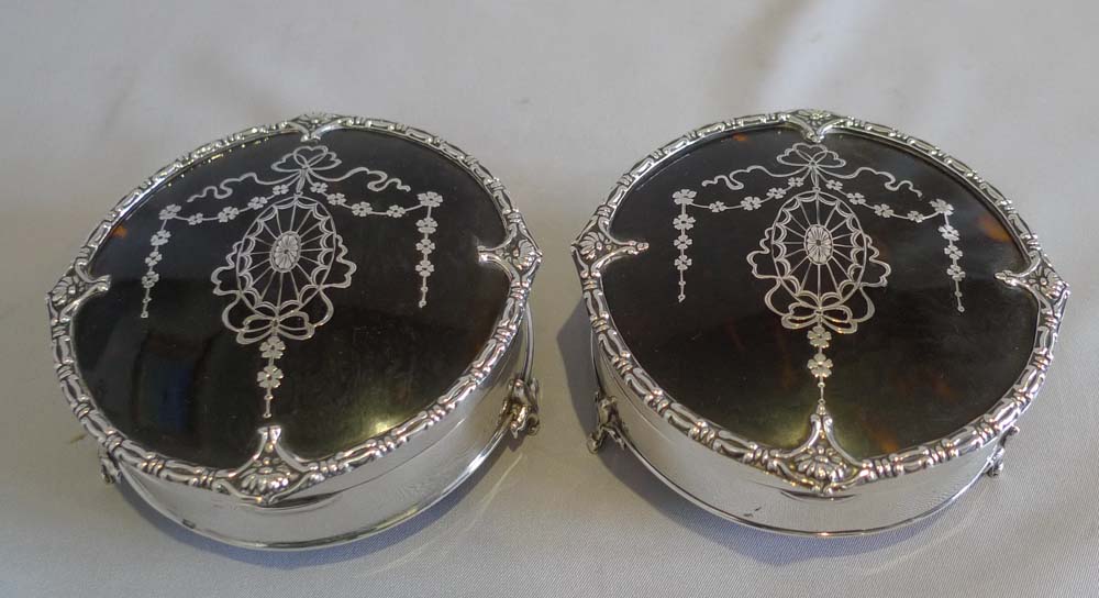 Pair tortoiseshell, silver and silver pique boxes by Mappin and Webb.