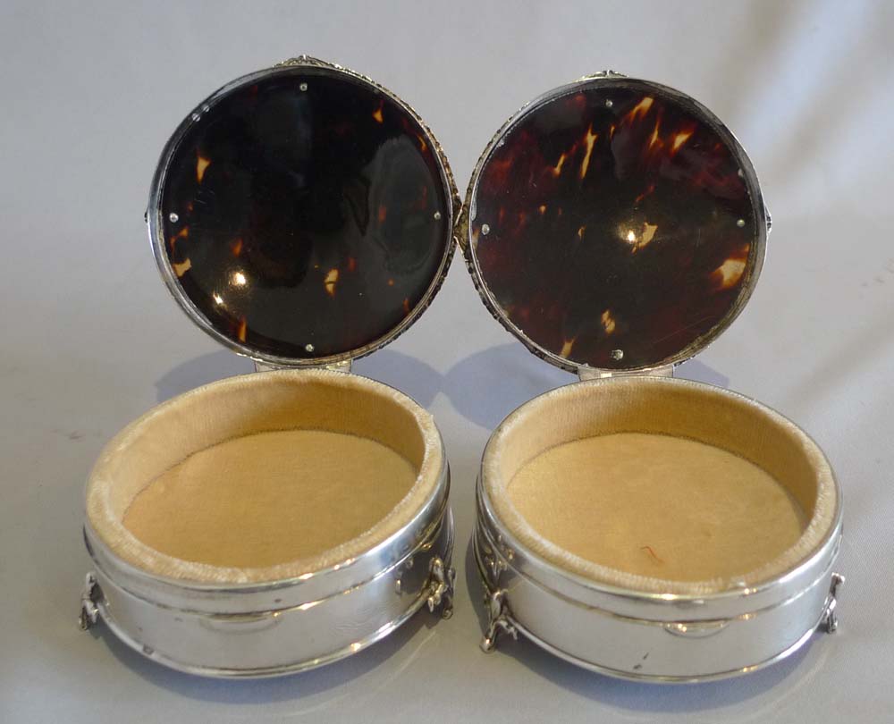 Pair tortoiseshell, silver and silver pique boxes by Mappin and Webb.