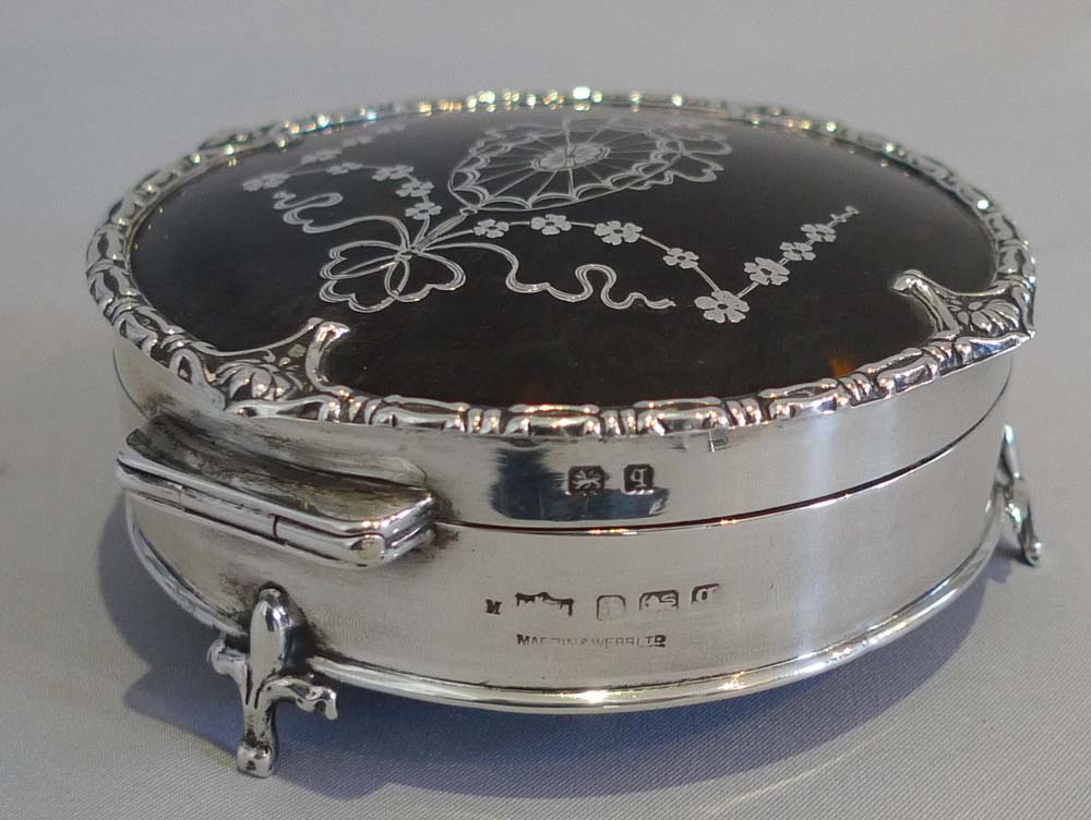 Pair tortoiseshell, silver and silver pique boxes by Mappin and Webb.