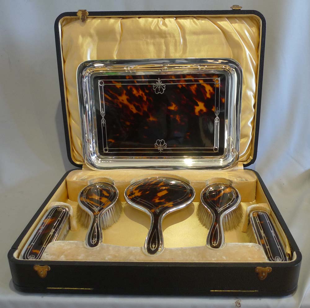 Silver and tortoiseshell dressing set in original case