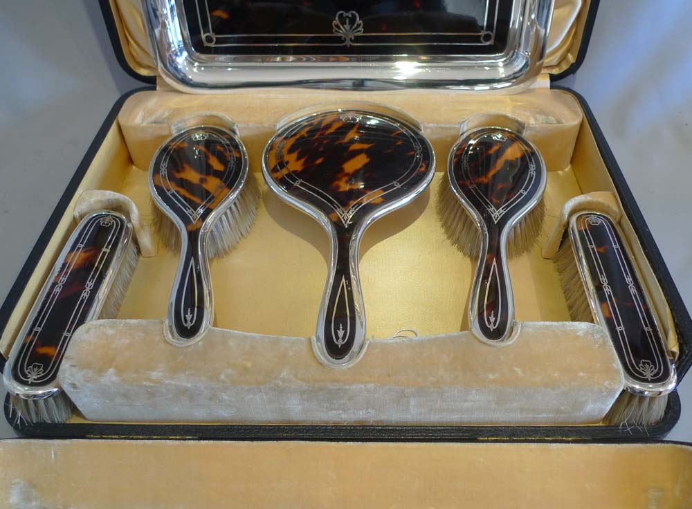 Silver and tortoiseshell dressing set in original case